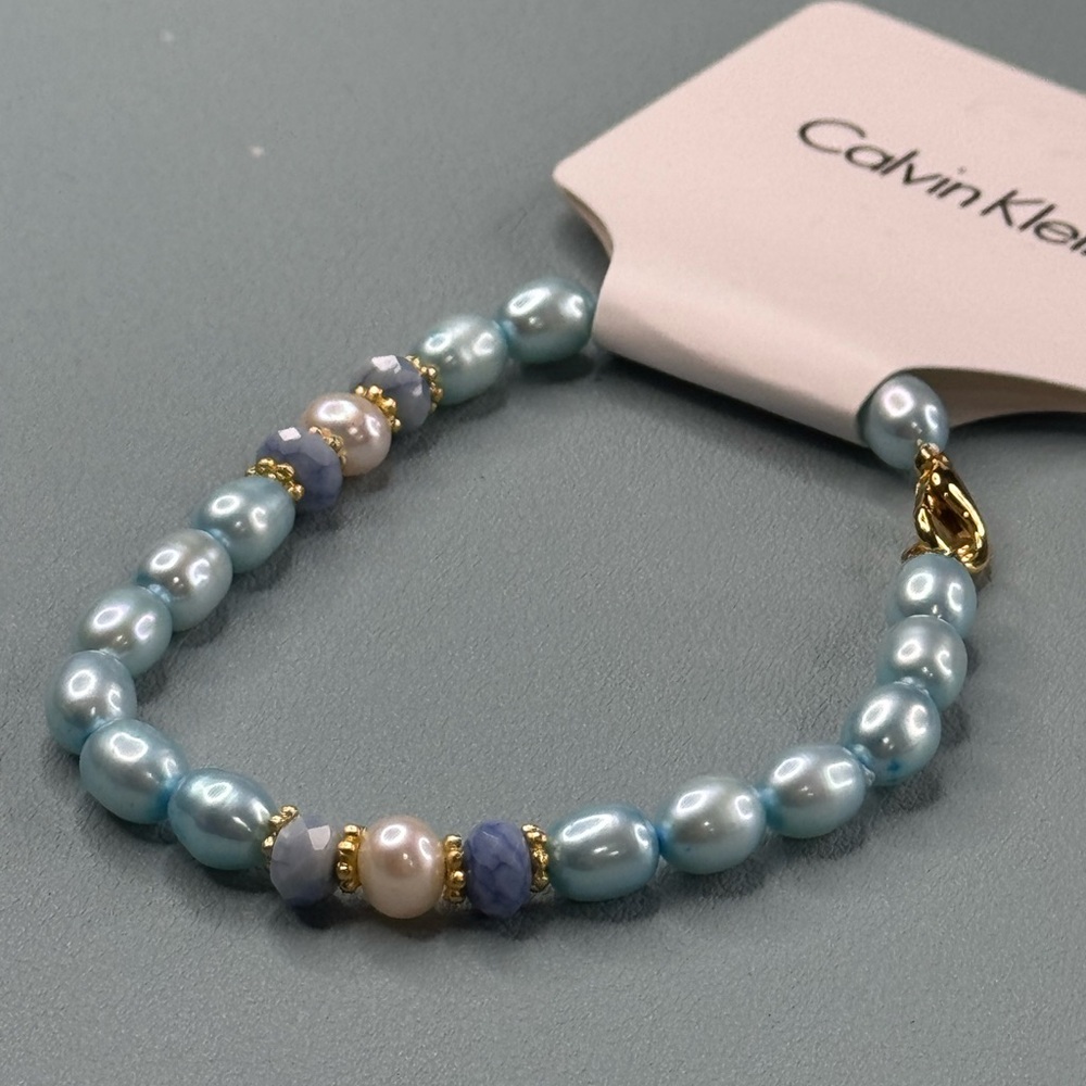 Calvin Klein Blue and Gold Bracelet with Sophisticated Design